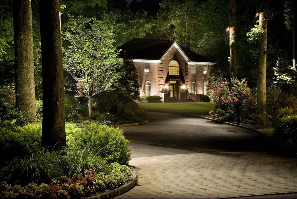 Driveway lights leading down to house