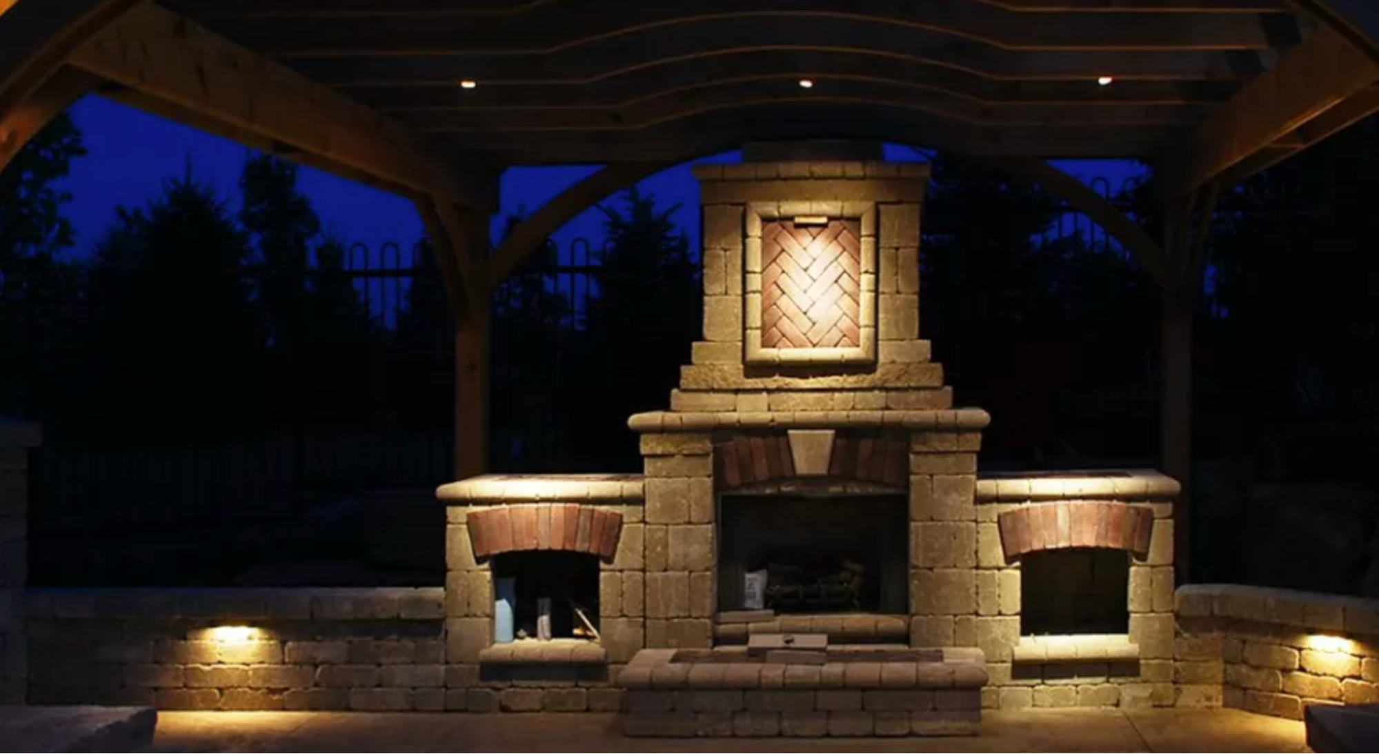 Use wall lights to highlight architectural features near an entranceway.
